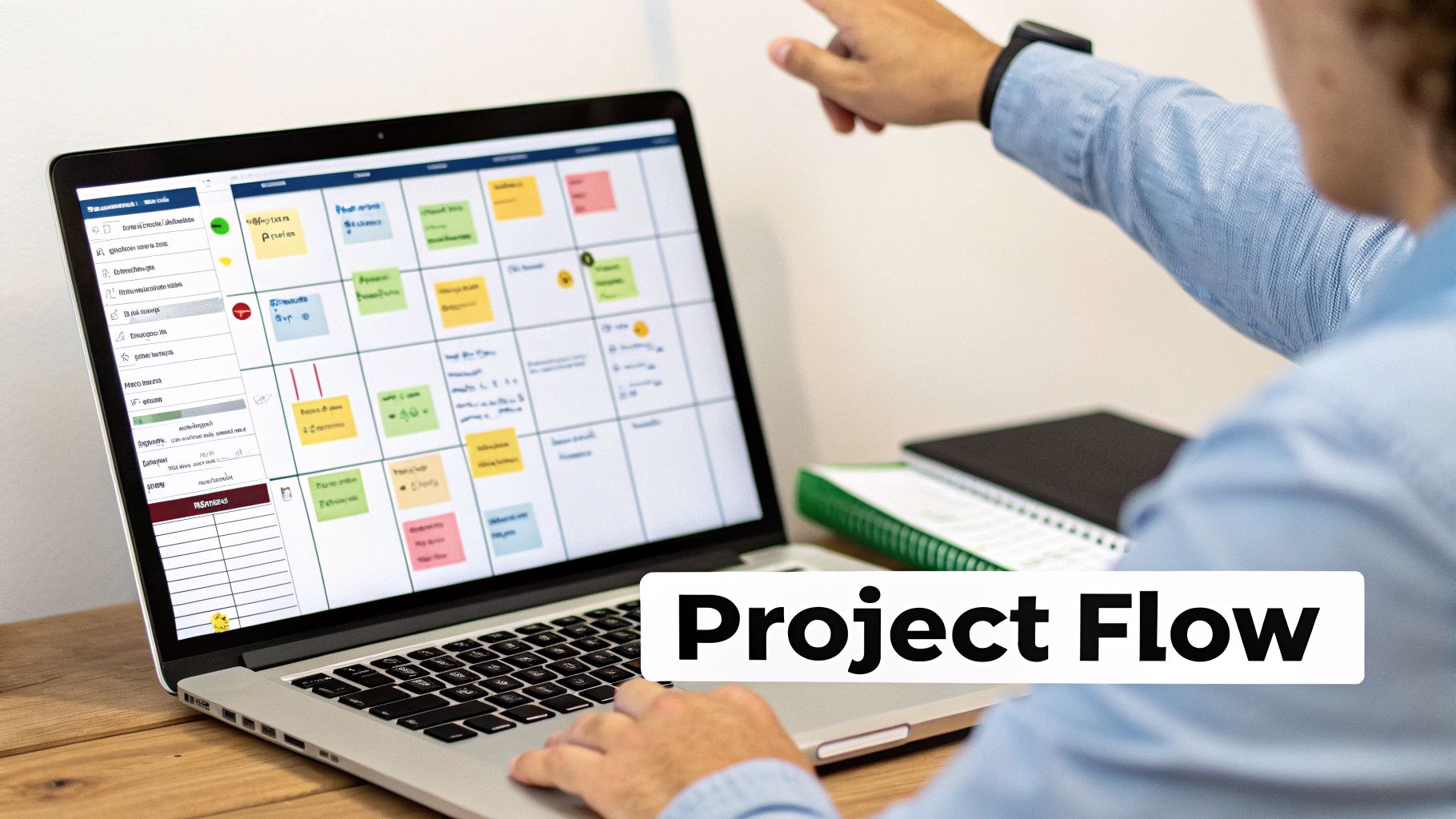 A person points at a laptop screen displaying a colorful project management board with tasks.
